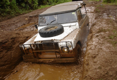 Jeep in mud wall